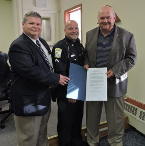 Thomas J. Giancristoforo, Jr. was named Aston Township Police Officer of the year. He is pictured with Police Chief Daniel Ruggieri and 5th Ward Commissioner Jim McGinn. Photo by Loretta Rodgers