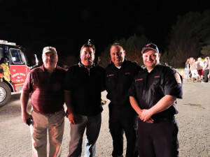 Aston Commissioner Mike Higgins poses with Joe McColgan, township planning commission chairman; ATFD President Sean Joyce, and AFTD Fire Chief Mike Evans - by Loretta Rodgers