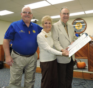 Bill and Ann Nixon  with Commissioner Mike Higgins